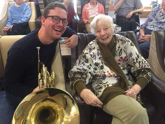 Orchestra of the Swan's Craig Macdonald entertains residents at Birmingham Care Homes caring for those with dementia